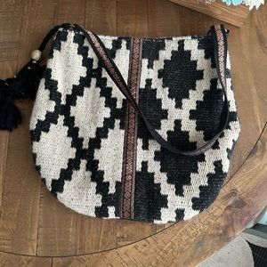 Lovestitch wool bucket hobo bag